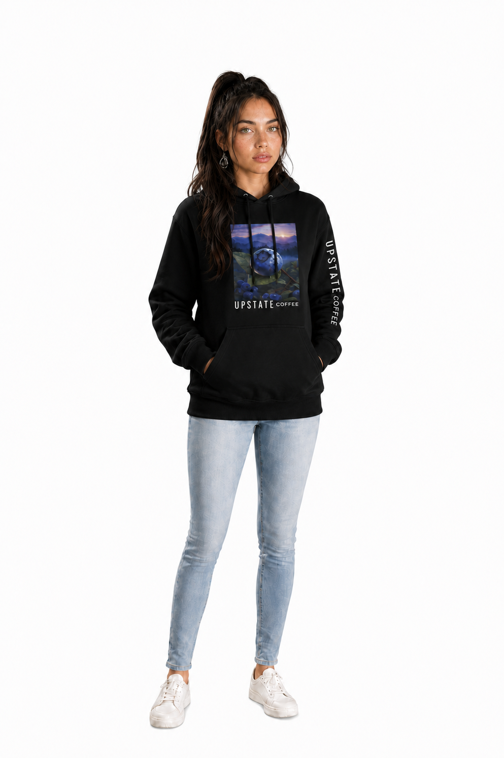 Woman wearing a black hoodie with a blueberry graphic design on a white background Upstate Coffee