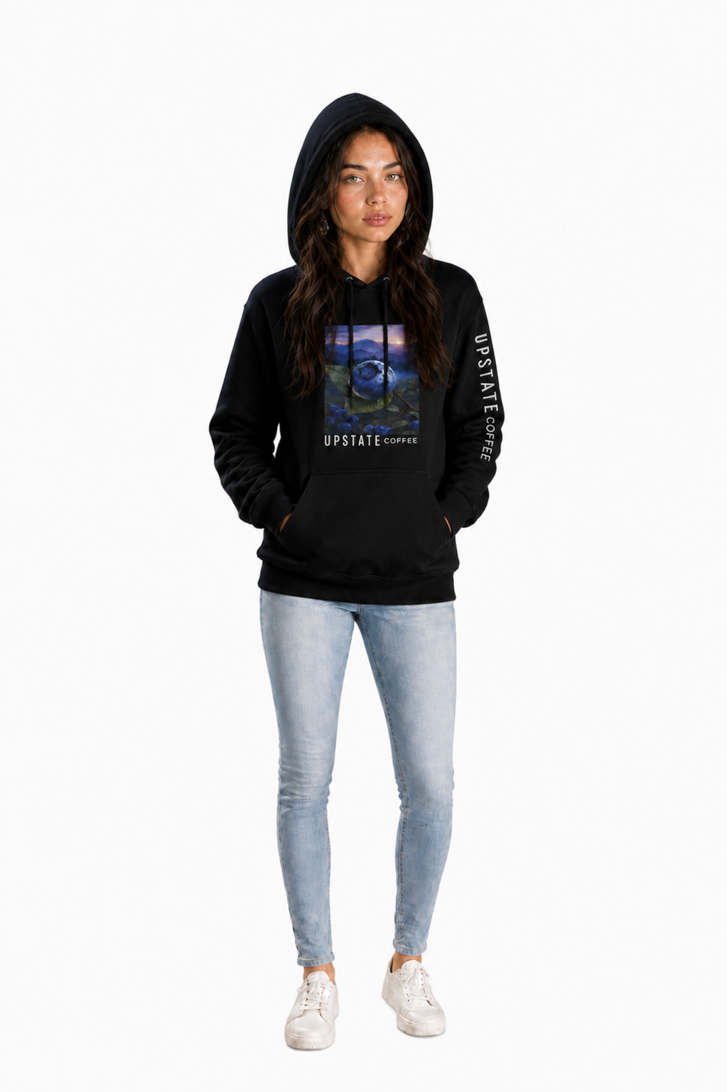 Woman wearing a black hoodie with a blueberry graphic design on a white background Upstate Coffee