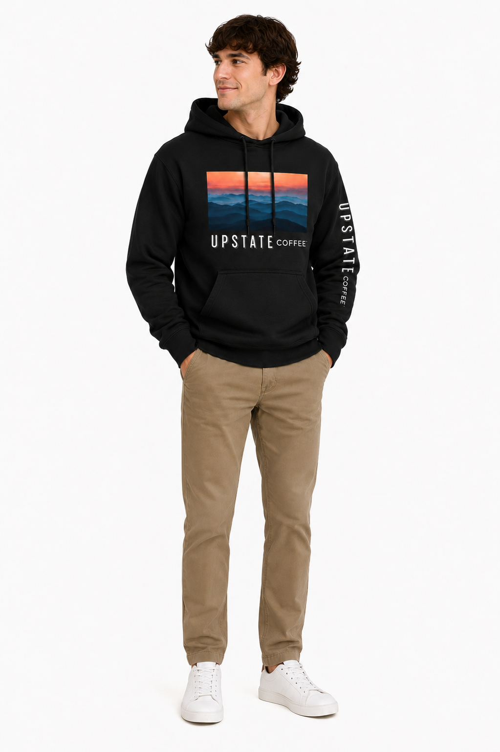 Man wearing a black hoodie with 'Upstate Coffee' mountain design on a white background
