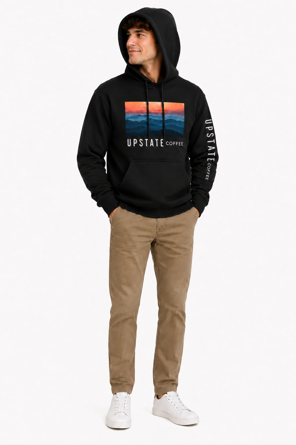 Male model wearing a black hoodie with 'Upstate Coffee' mountain scene branding on a white background