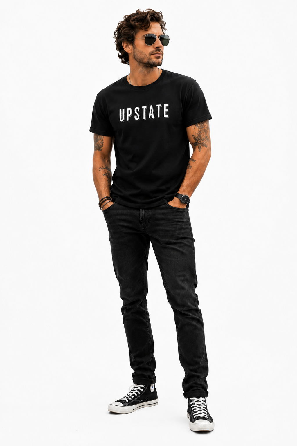 Man wearing a black t-shirt with 'UPSTATE' text, black jeans, and sunglasses on a white background