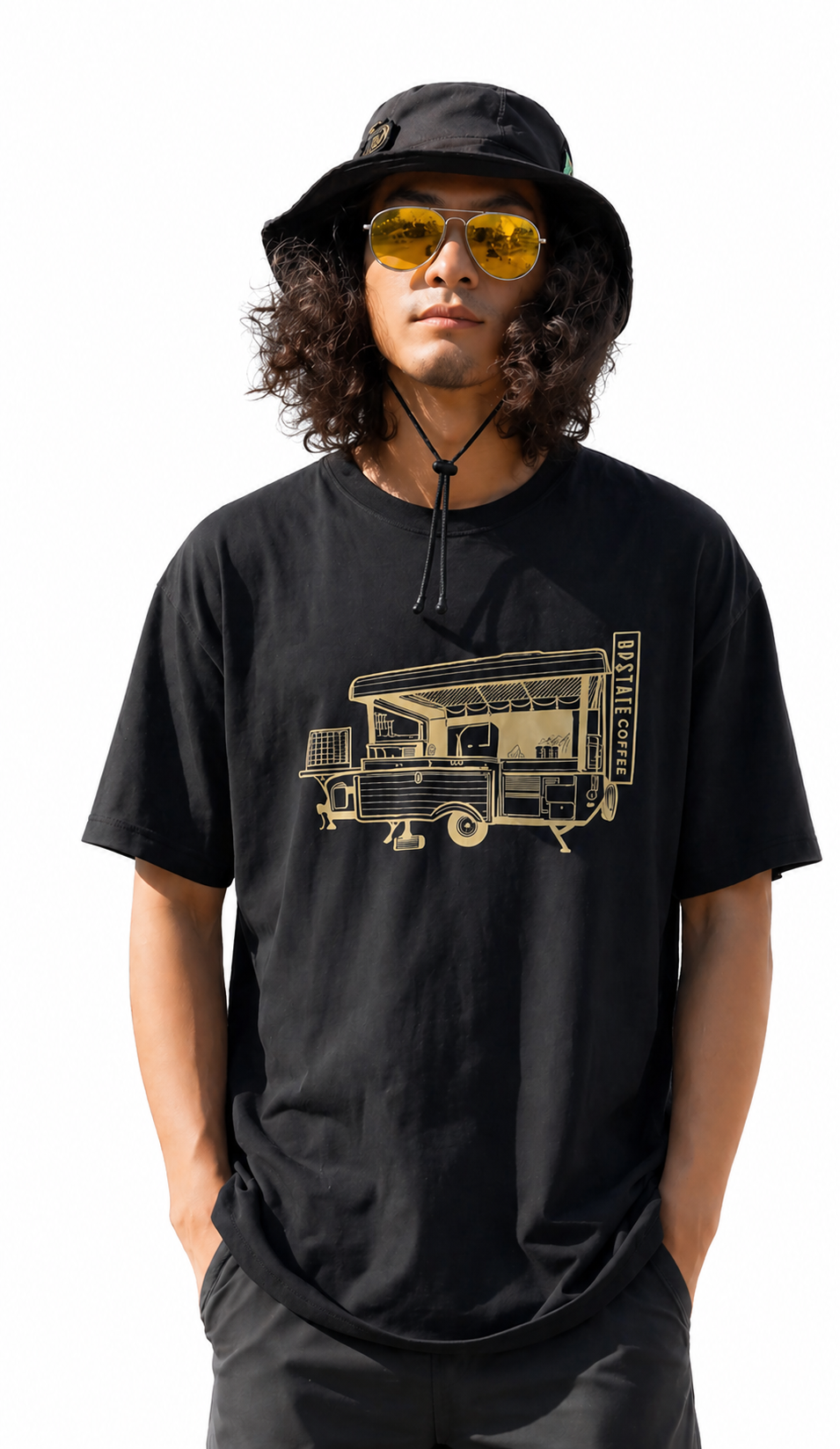 cool vibe model wearing a black t-shirt with a Original Upstate Coffee Camper Café T-Shirt graphic design, black pants, and a black hat on a white background
